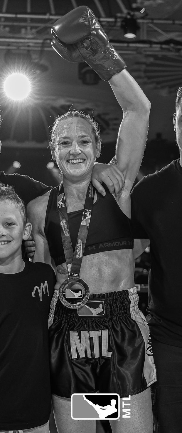 Mardi with her glove raised after a fight